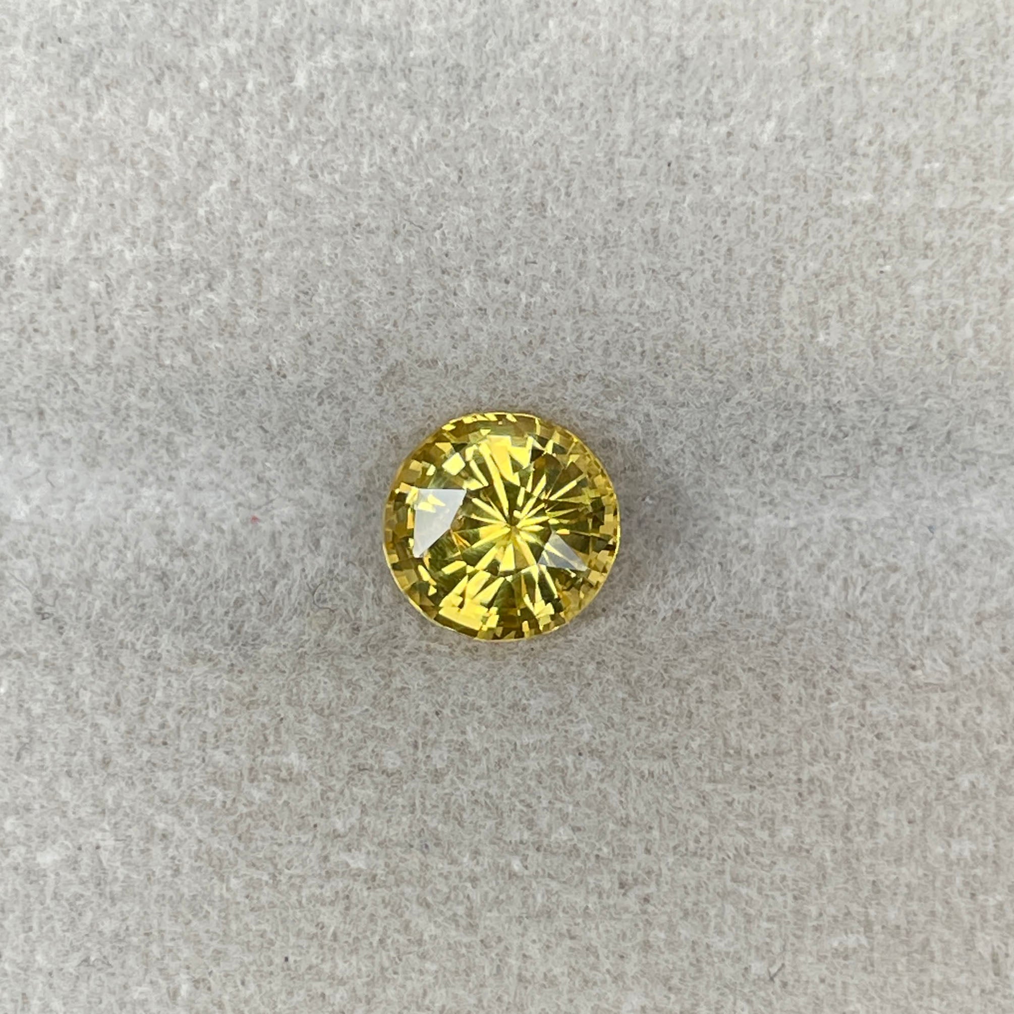 yellow round sapphire 1.58