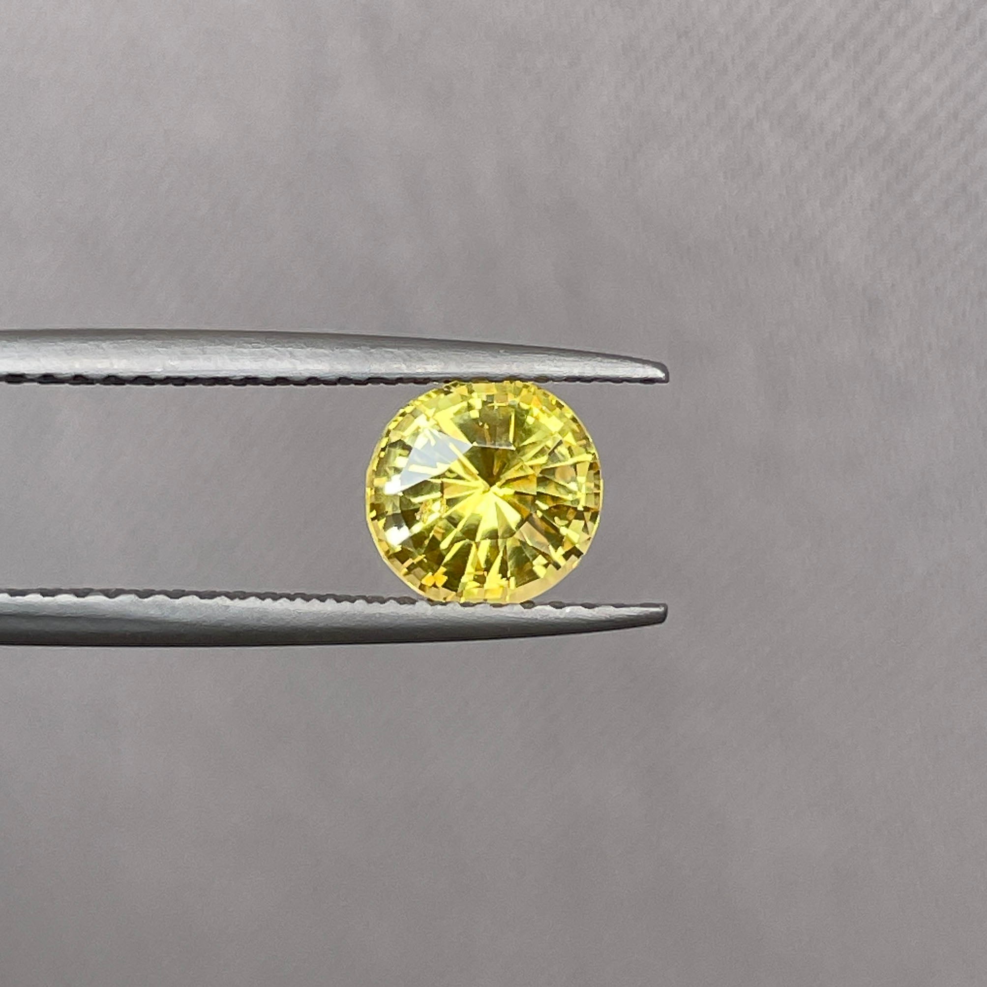 yellow round sapphire 1.58
