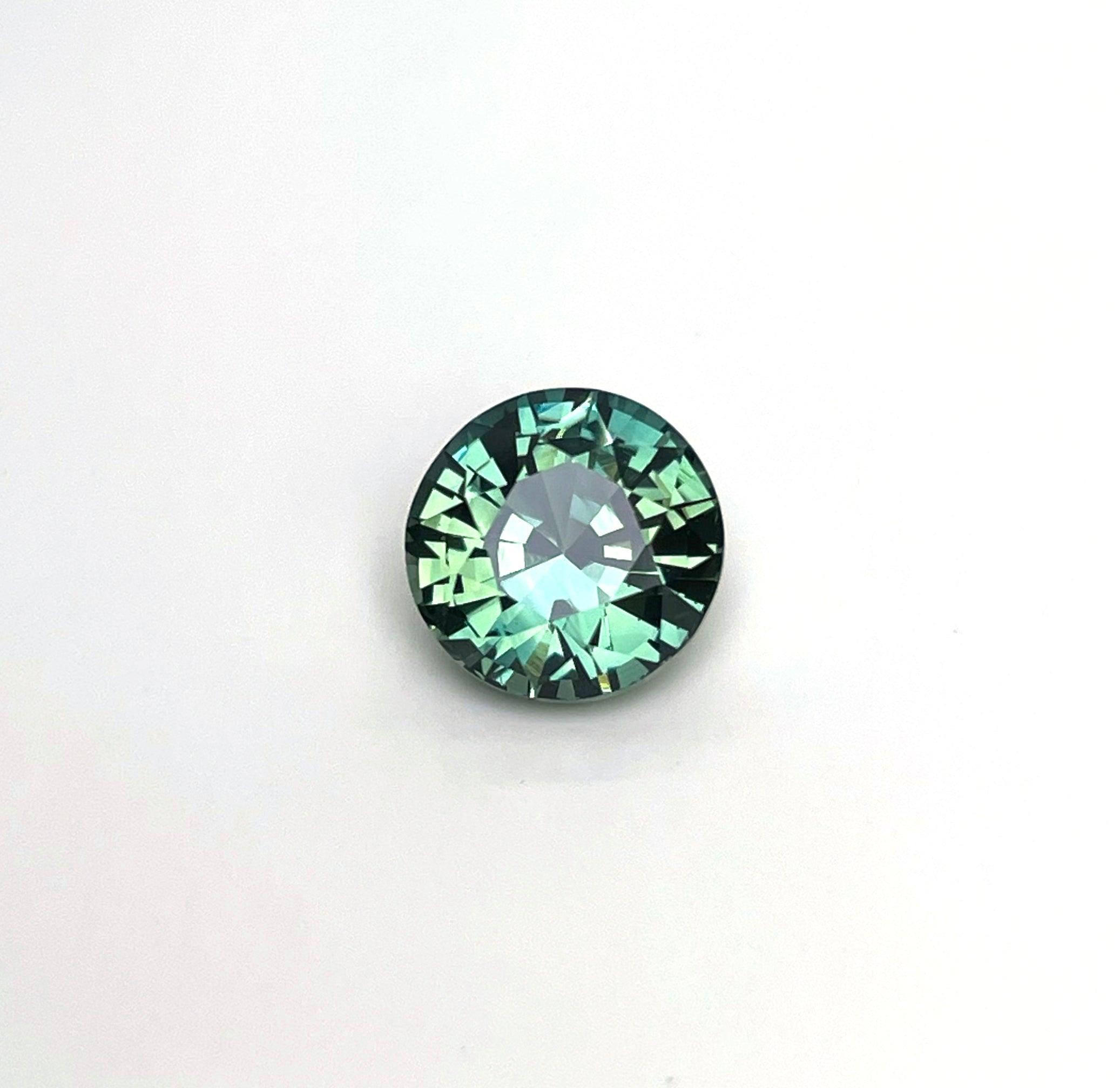 2.22 carat Teal/ Parti Sapphire is well cut to bring out the best colour and luster,