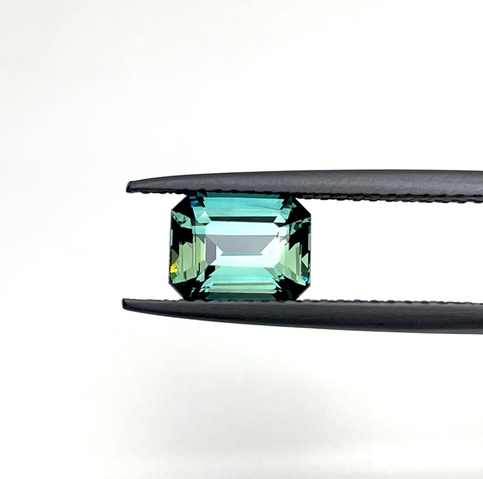 1.68 carat Teal/ Parti Sapphire is well cut to bring out the best colour and luster
