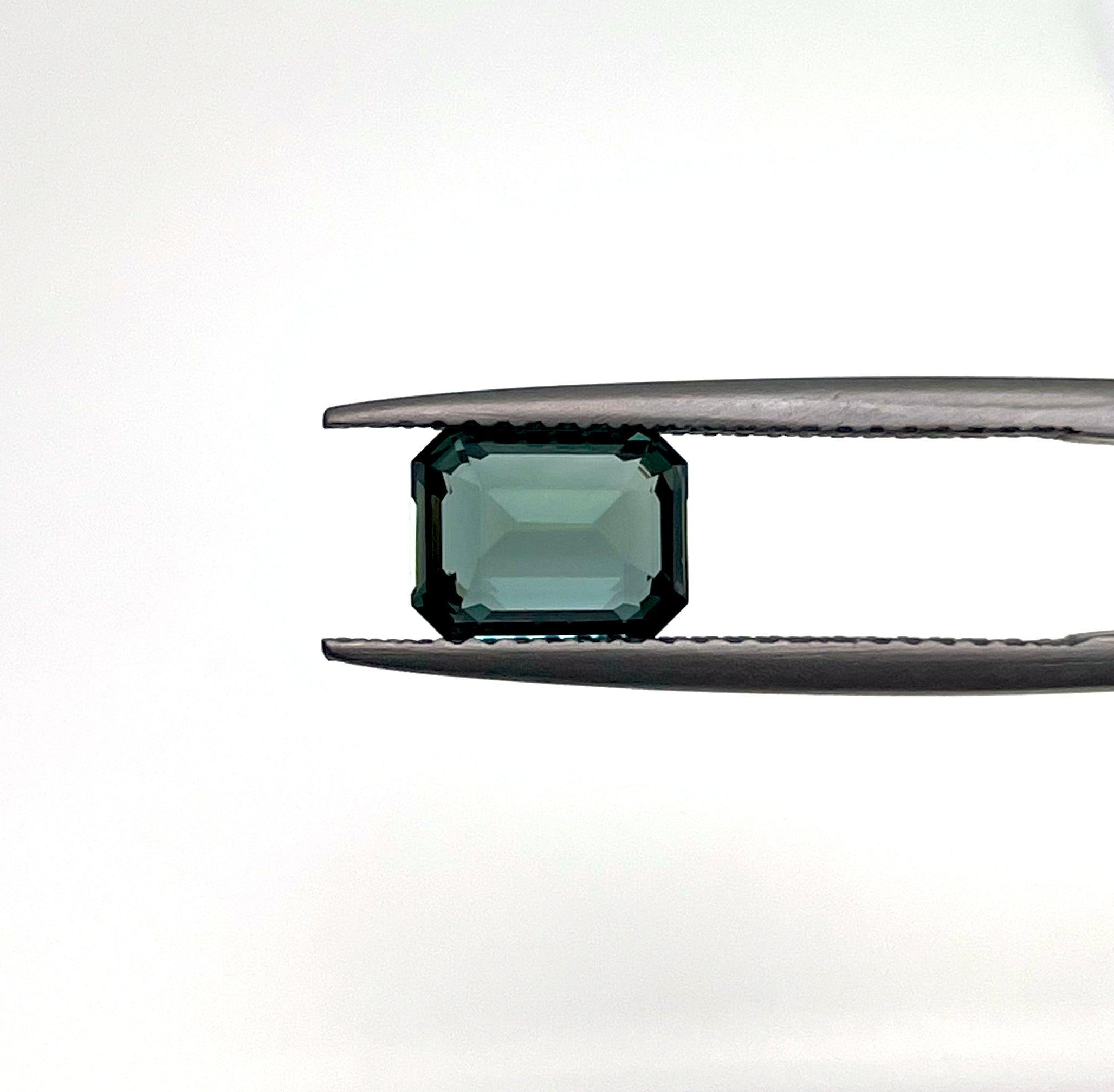 1.68 carat Teal/ Parti Sapphire is well cut to bring out the best colour and luster
