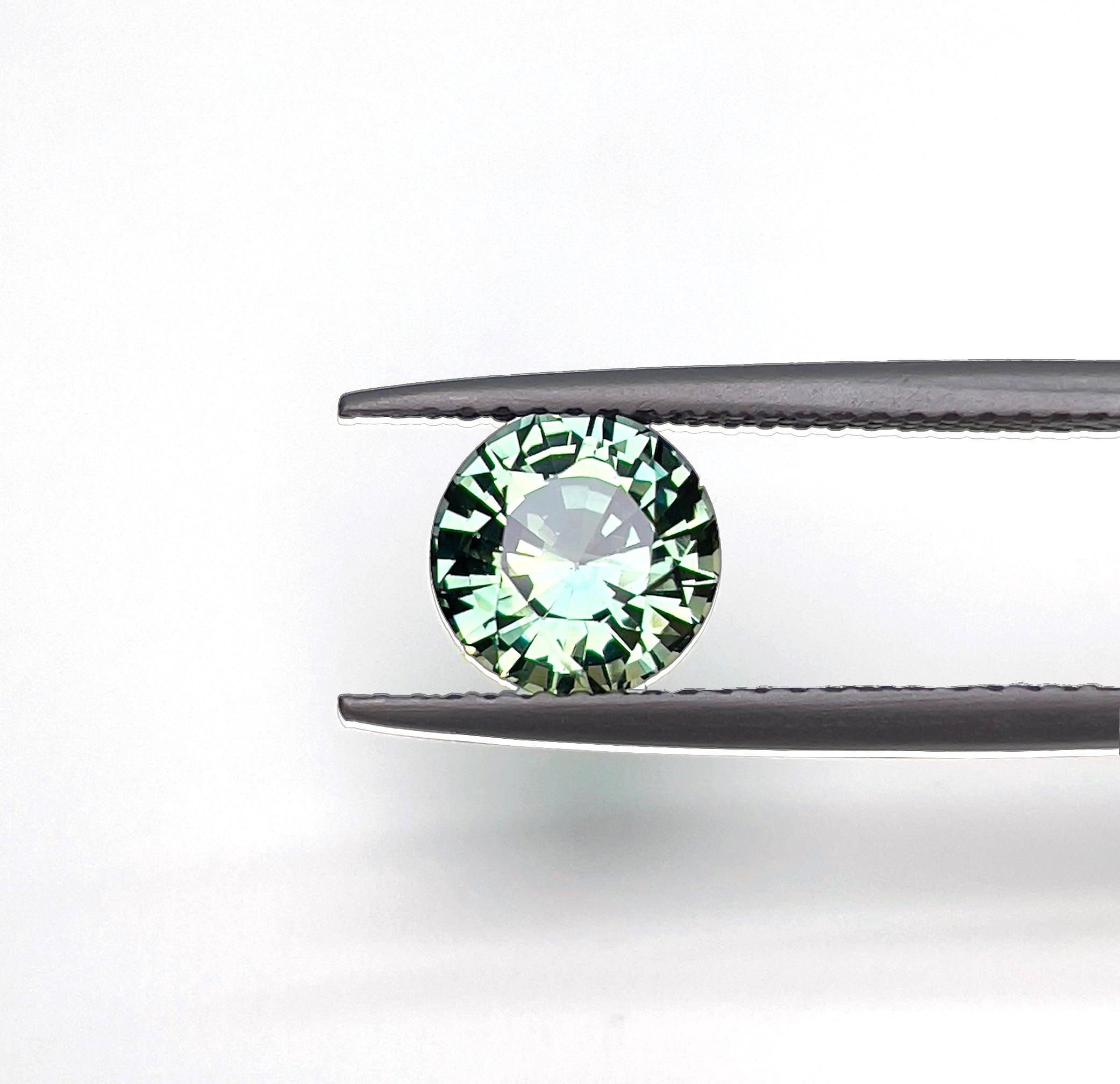 1.72 carat Parti Sapphire is well cut to bring out the best colour and luster,