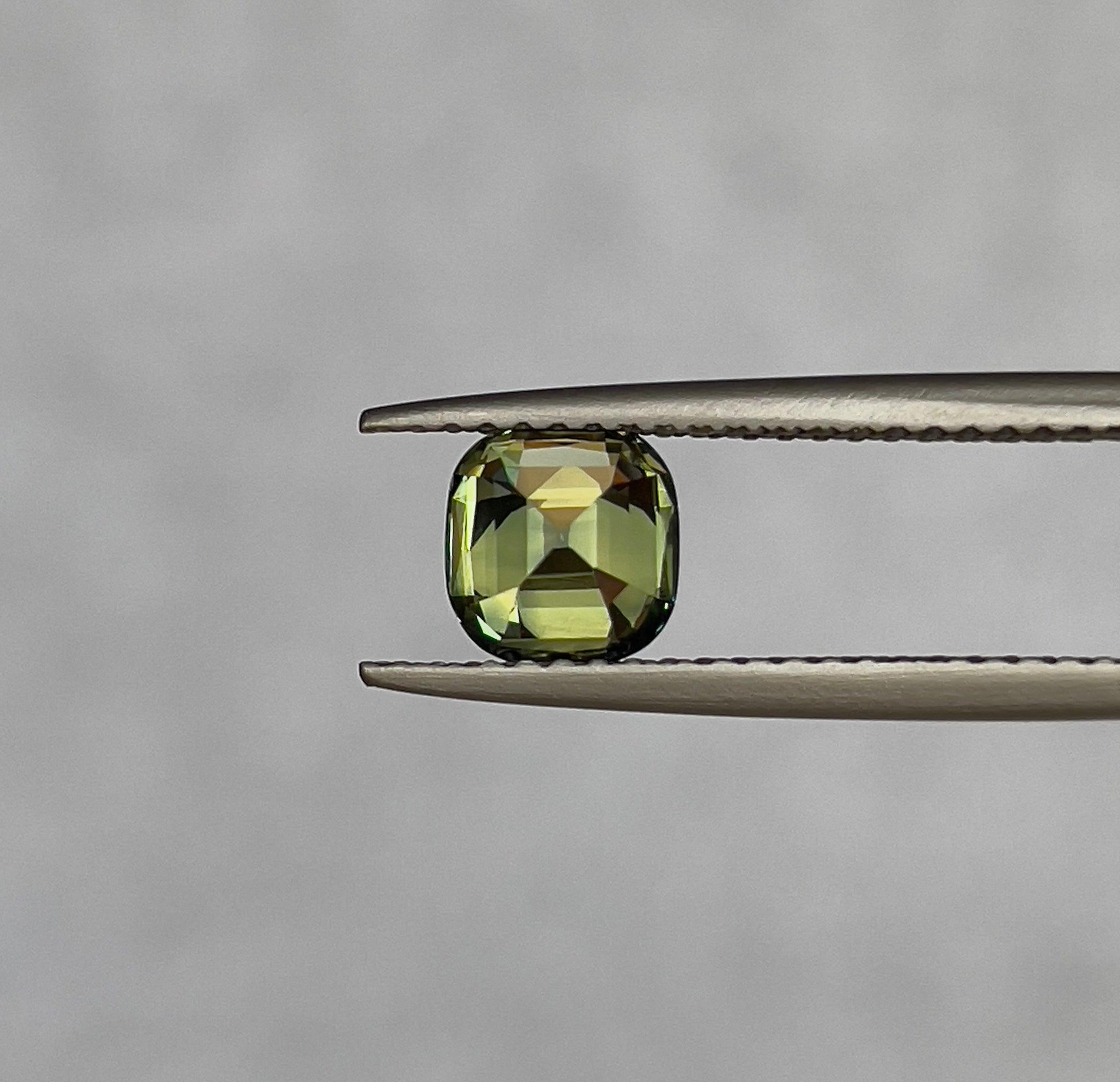 teal blue green parti sapphire cushion cut gem 
