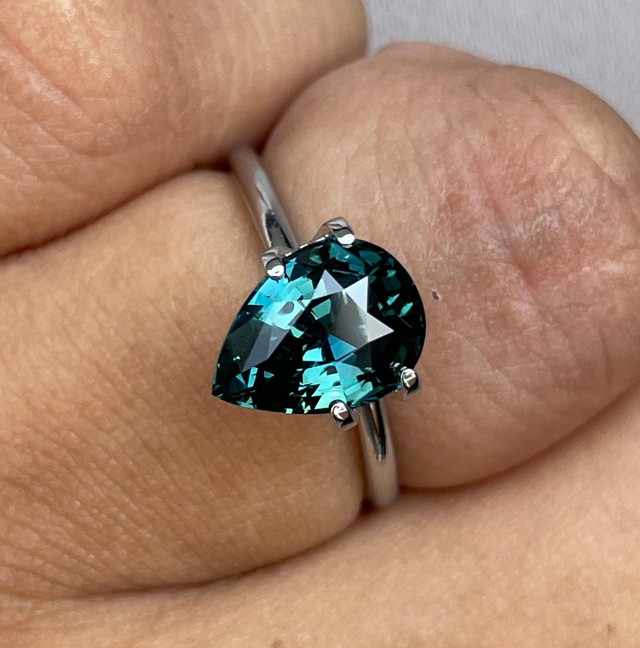 teal blue green parti sapphire pear drop cut gem 