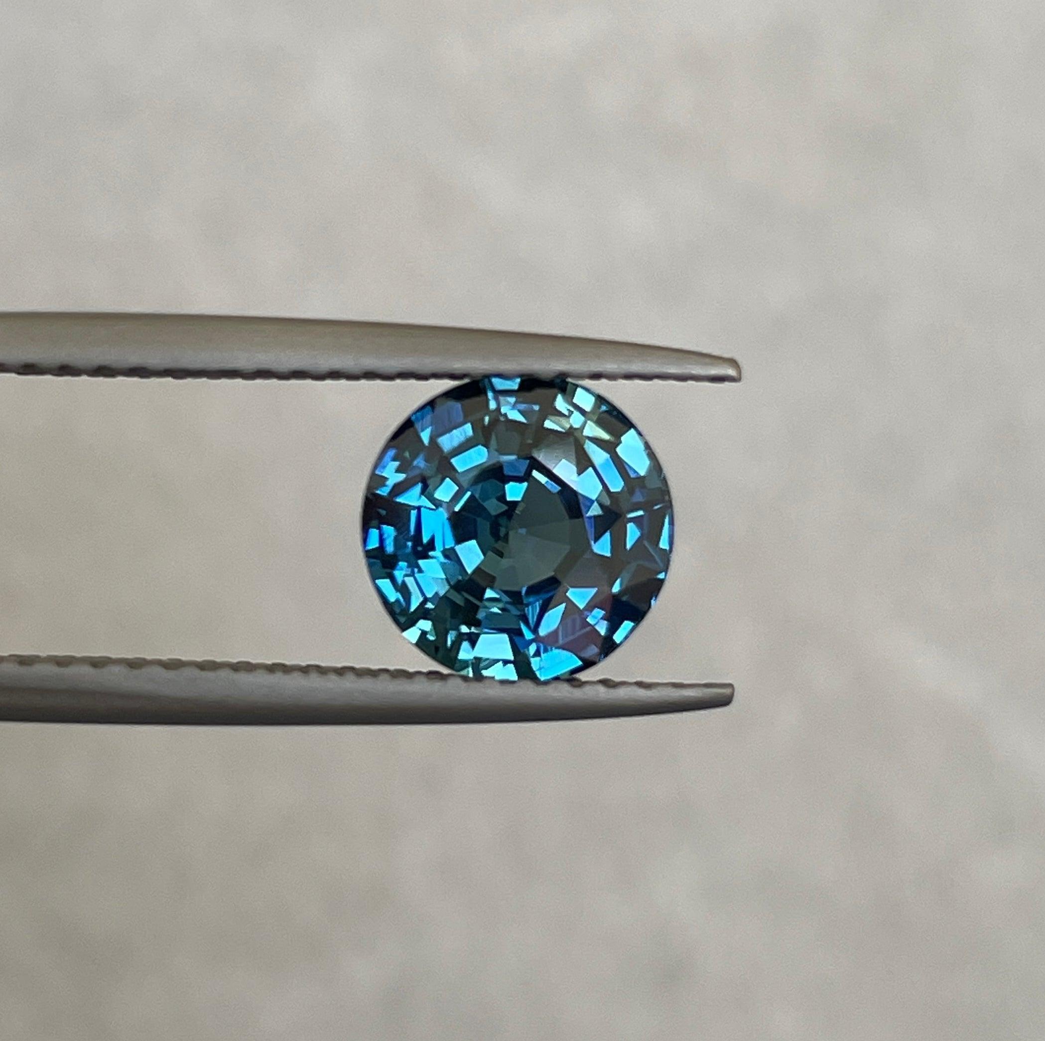 teal blue green parti sapphire round cut gem 