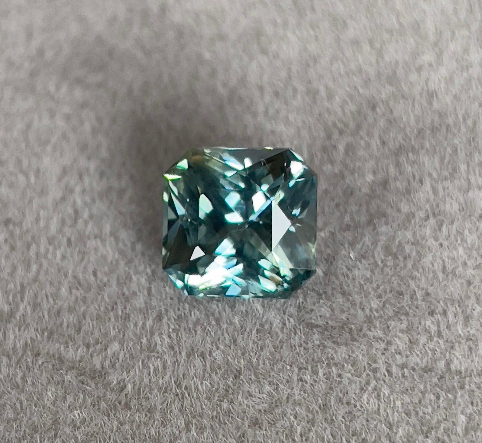 teal sapphire engagement rings