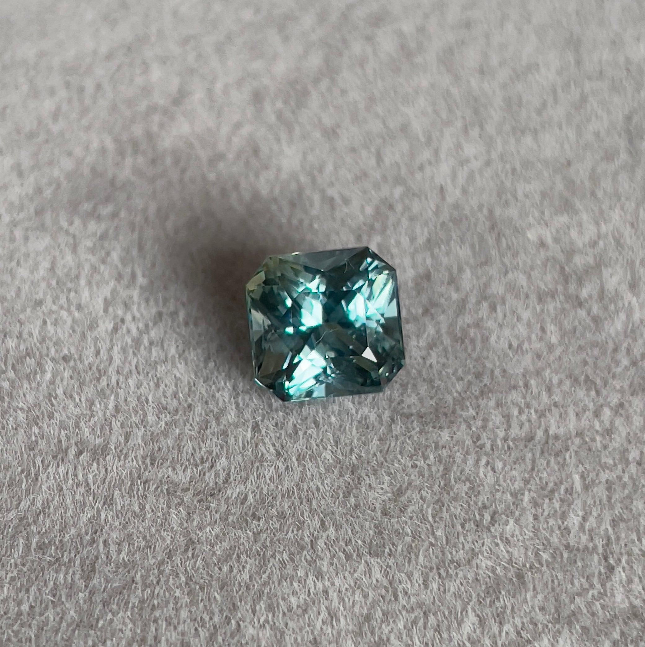teal sapphire engagement rings
